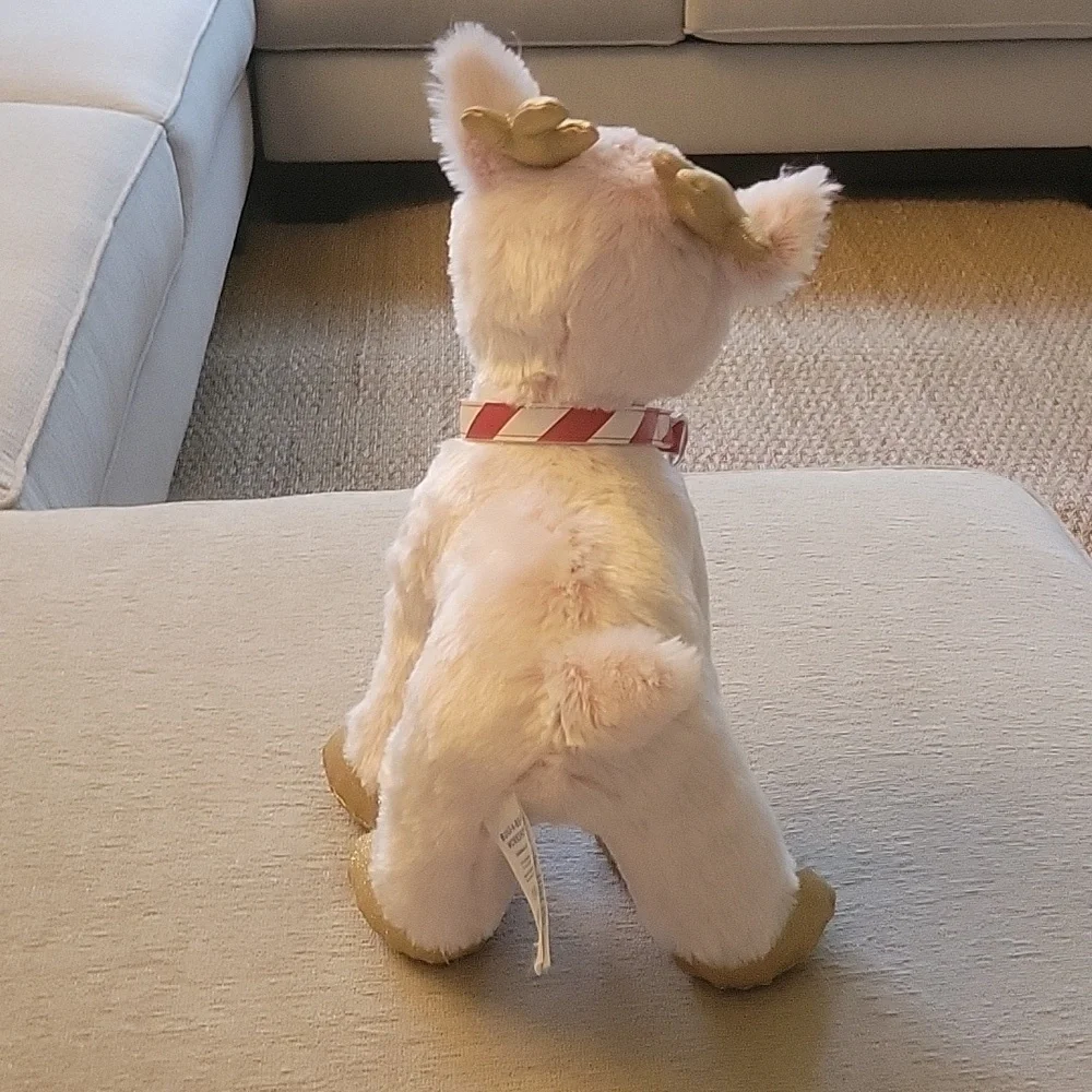 BAB Arctic pink baby reindeer with red & white striped collar. Build A Bear